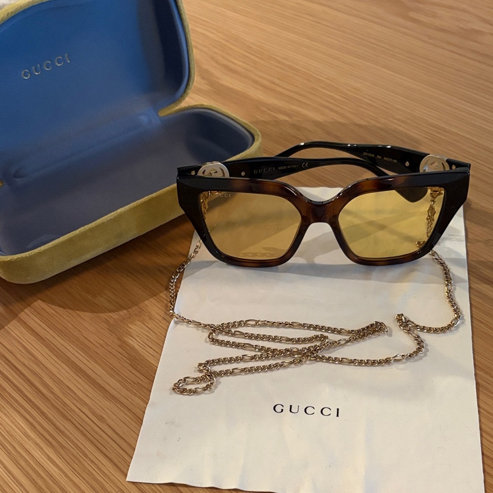 Gucci Women's Tortoiseshell Frame Yellow Lens Sunglasses with Gold Chain Accent